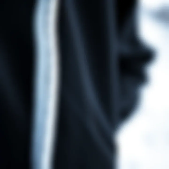 Close-up of the fabric texture of a black zippy hoodie