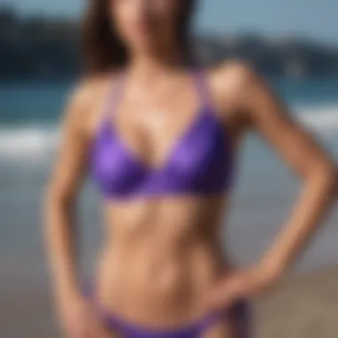 A variety of purple bathing suits displayed together