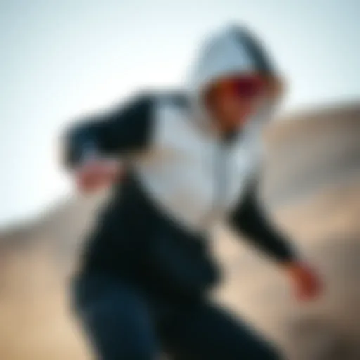 Dynamic athlete showcasing the black and white zip-up hoodie in action