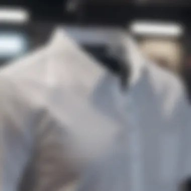 Classic white short sleeve button-up shirt displayed on a tailored mannequin, highlighting its crisp design.