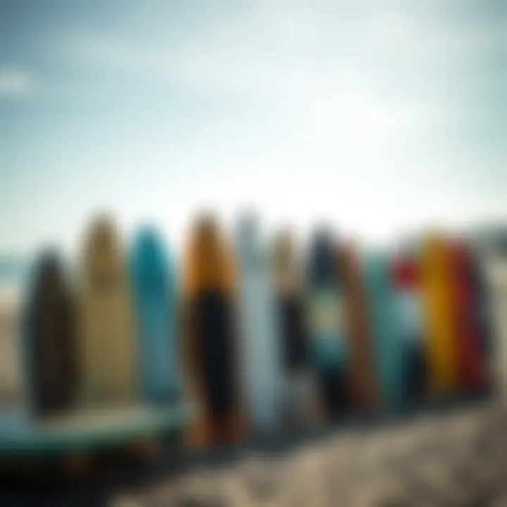 An array of Torq surfboards displayed on a beach setting