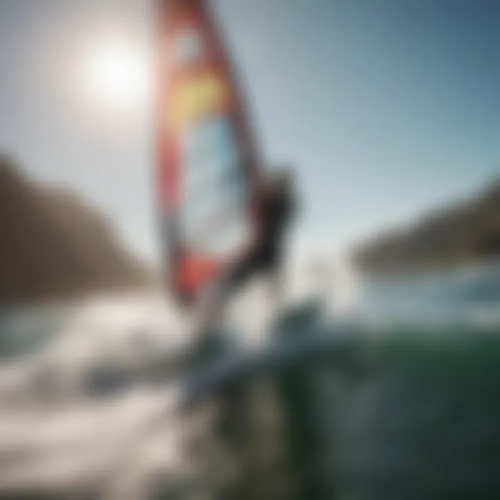 A windsurfer navigating through waves on a bright sunny day